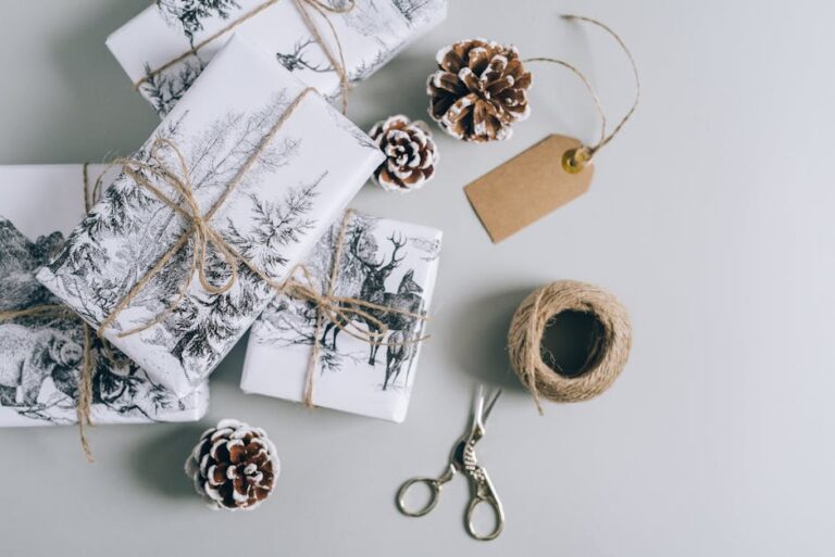 Beautifully wrapped Christmas presents with pine cones and twine in a minimalist style. Perfect for holiday inspiration.