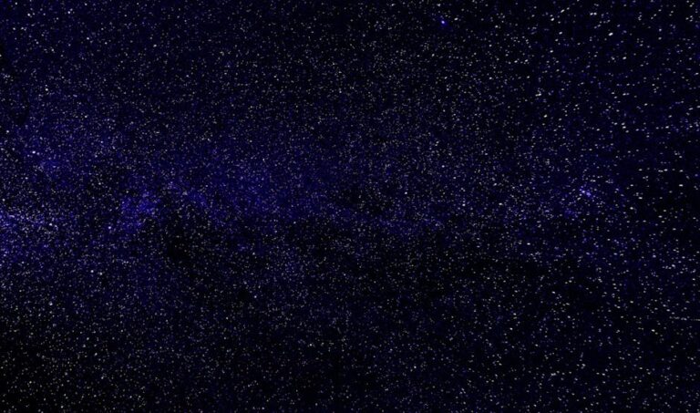 Explore the vast universe with this beautiful night sky filled with stars and galaxies.