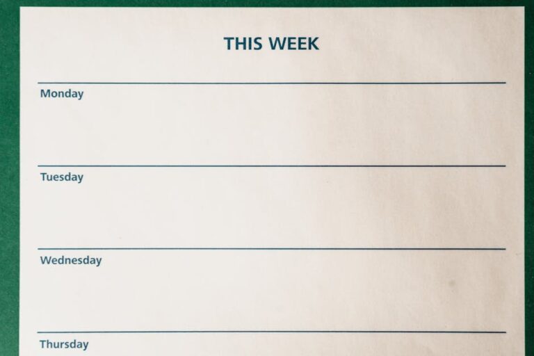 Minimalist blank weekly planner with days for scheduling and organizing tasks.